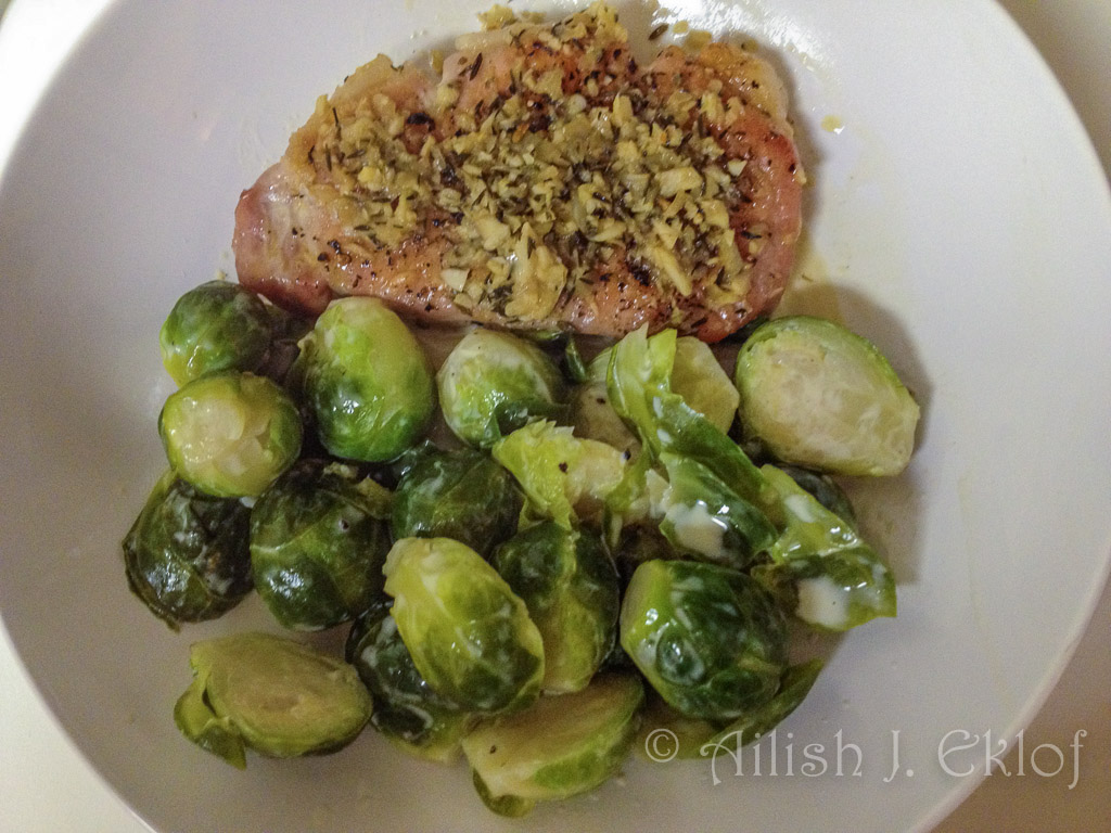 Pork chop with Brussels sprouts braised in cream
