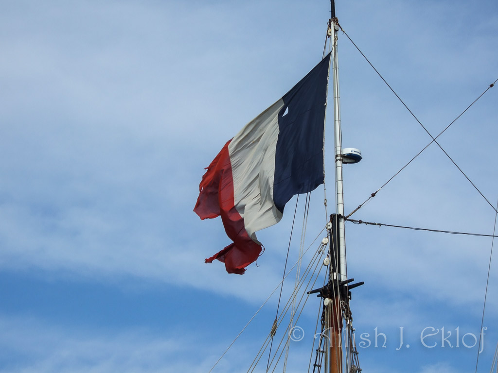 Tattered French flag on the Belle Poule